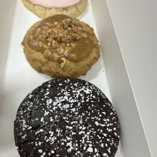 Pink frosting, peanut butter brittle, molten lava.