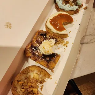 three donuts in a box