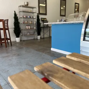 a view of a counter and chairs