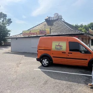 a man standing in front of a van