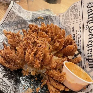 Blooming onion shared at a table of 9--with leftovers.