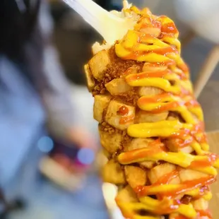 Potato mozza with hot sauce and mustard.