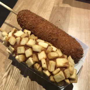 A regular hot dog and a mozzarella and potato!