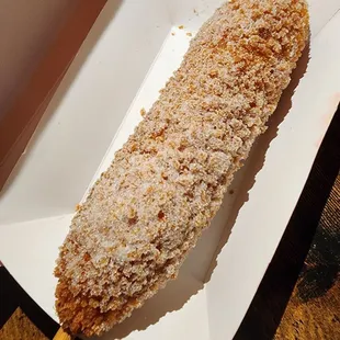 a fried corn on a stick