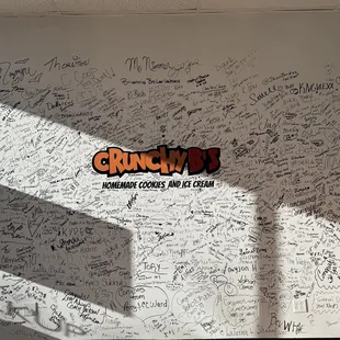 a wall covered in writing