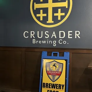 a sign for crusader brewing