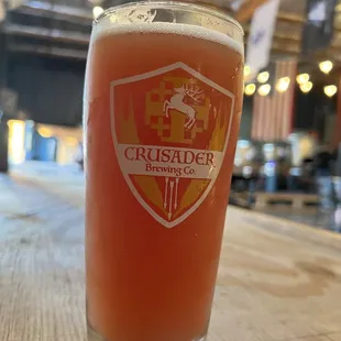 a glass of beer on a table