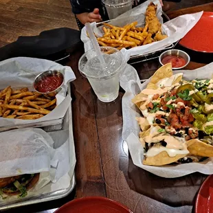 great smash burger $14 and nachos $15...kid tenders $9...$49 total after tax and tip above...