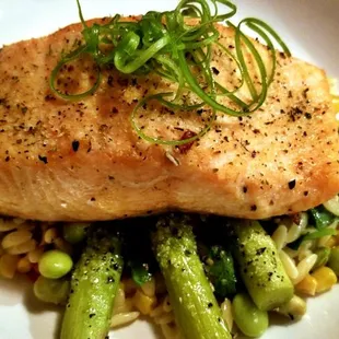 Chef's salmon was amazing! Perfectly cooked and seasoned salmon atop asparagus and a bed of orzo, edamame, spinach, corn and peppers.