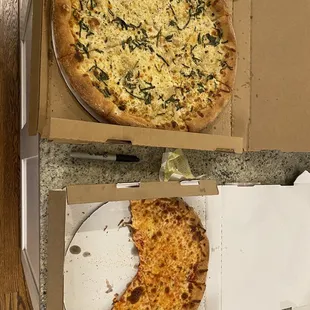 Sharpie in there for scale. 16&quot; Rose on the top, 12&quot; cheese on the bottom (minus two slices).