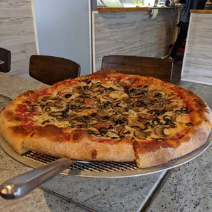 A 16&quot; pizza with shrooms and black olives at Crushed.