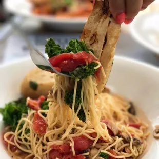 Crushed Pasta - angel hair pasta sautéed with garlic, tomatoes, mushrooms, kale and shaved parmesan