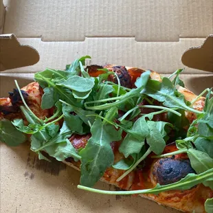 Pepperoni basil arugula garlic pizza