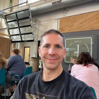 Chris J.