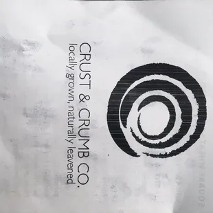 a paper bag with a logo on it