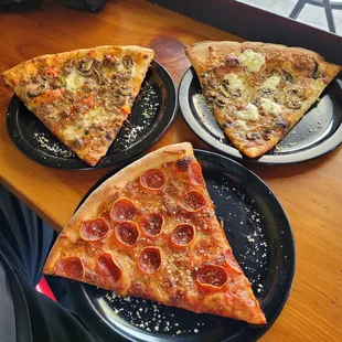 From left to right: sausage mushroom pepper, mushroom fresh mozzarella, pepperoni