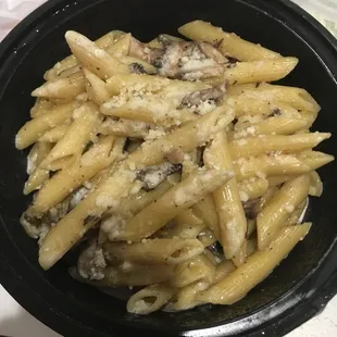 Penne pasta with mushroom, cream sauce, and truffle oil!