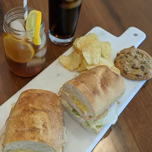 Enjoy our freshly baked sourdough sandwiches, signature cookies, chips and refreshing specialty drinks