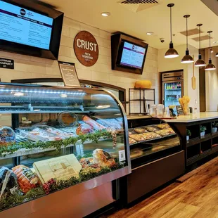 a counter with a variety of baked goods