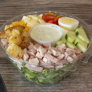 Chefs's chopped salad - Turkey, Ham, Egg, Romaine, Cucumber, Cherry Tomato, Swiss/Cheddar, House croutons, House Ranch