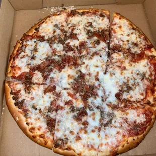 Mozzarella, Romano and Parmesan Cheese with Pepperoni, Bacon and Beef. Honestly their pizza is just okay.