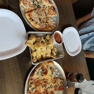 Personal Margherita pizza, pepperoni pizza, garlic knots