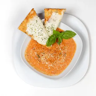 Tomato Basil Soup - served with garlic cheese bread.  Offered for dine or or takeout.