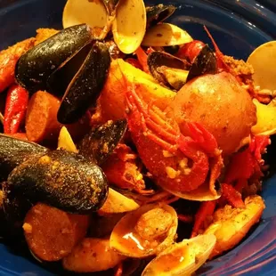 House bag w/ magic dust: 2lbs of crawfish, mussels, clams, potatoes and sausage.