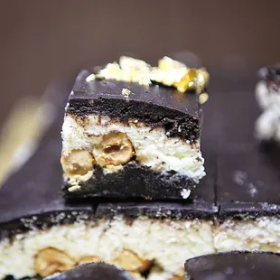 a piece of chocolate cake with a bite taken out of it