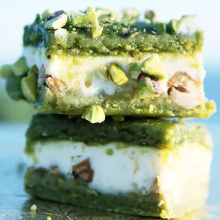 a close up of a stack of desserts