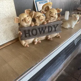 three pigs in a wagon