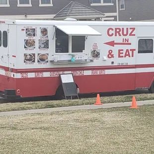 a red and white food truck