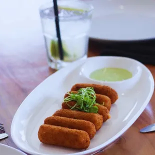 a plate of fried fish fingers