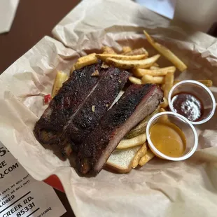 Ribs are perfection! Fries and pickle slices are top notch too! Don&apos;t leave without trying the sauces, you won&apos;t be disappointed!