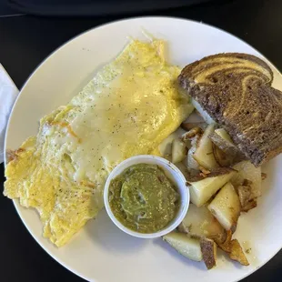 California Omelet* with rye bread toast and home fries