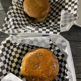 Bunqua burger on top  Satoshi burger on bottom