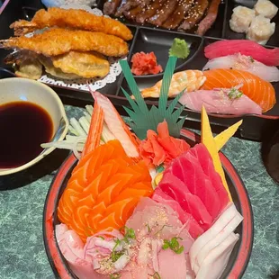 front: chirashi back: 2,1,1 bento (beef teriyaki, shrimp/vegetable tempura, 5 piece nigiri)