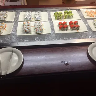 a variety of sushi and rolls