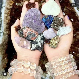 Gemstone bracelets and mineral clusters.