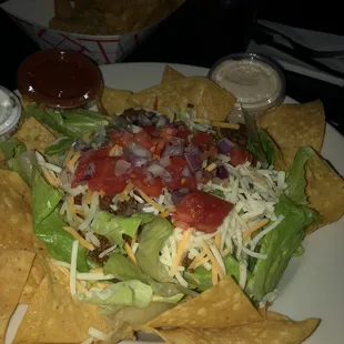 Taco salad served with extra warm tortilla chips
