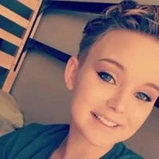 Rebecca E.