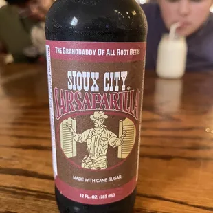a bottle of beer on a table