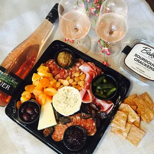 Every Friday, we offer a date night to-go package featuring a decadent cheese tray, bottle of wine and crackers or Demi-baguette for $40.