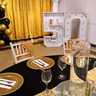 Black and Gold 50th Birthday Party Decoration at Crystal Reception Hall.