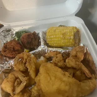 Delicious Pollock, Shrimp and corn on the cob hush puppies. Nice clean establishment, friendly quote atmosphere.