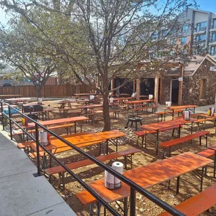 Huge outside seating area is really cool with corn hole games on the side