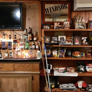 a bar with liquor and liquor bottles