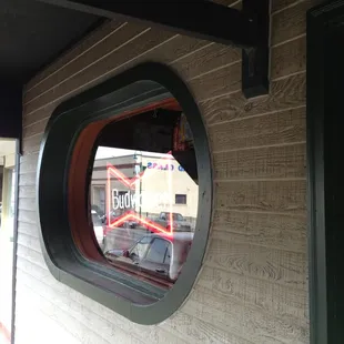 the reflection of a window in a circular window