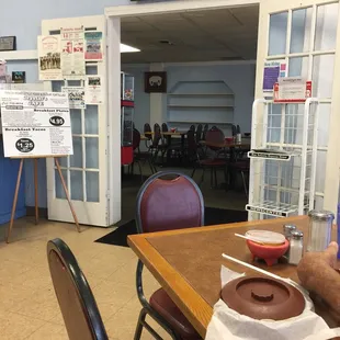 Its a second room, like a dinning area. The face of the place disguises it very well.
