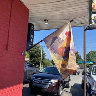a car parked in front of the restaurant